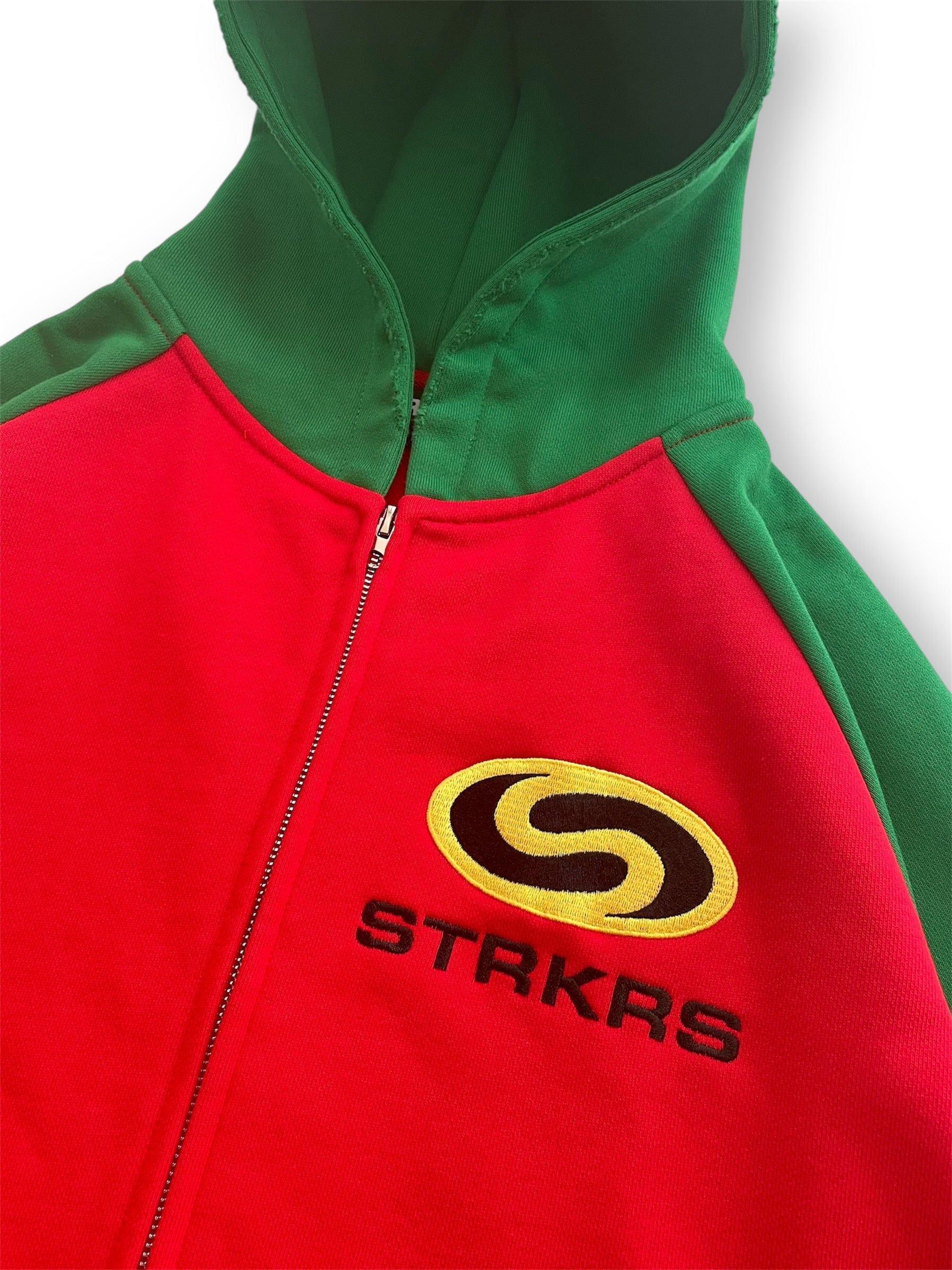 STRKRS reg and green mens women's unisex 100% French Terry cotton heavyweight raglan sleeve relaxed fit ROBIN hoodie. STRKRS Balance Logo embroidered at left chest.