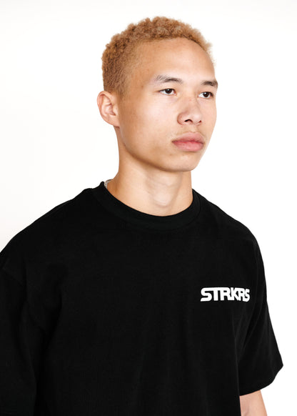 STRKRS black and white mens women's unisex 100% cotton heavyweight crewneck relaxed slightly oversized t-shirt. Single-minded Driven Purposeful on back of t-shirt