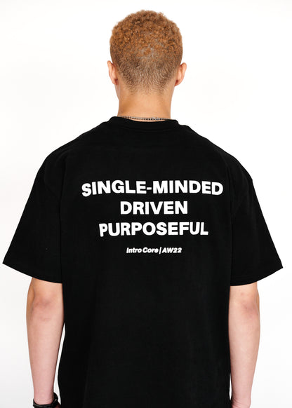STRKRS black and white mens women's unisex 100% cotton heavyweight crewneck relaxed slightly oversized t-shirt. Single-minded Driven Purposeful on back of t-shirt