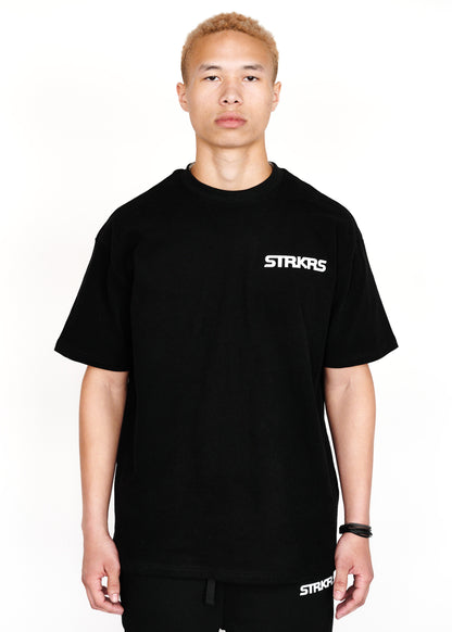 STRKRS black and white mens women's unisex 100% cotton heavyweight crewneck relaxed slightly oversized t-shirt. Single-minded Driven Purposeful on back of t-shirt