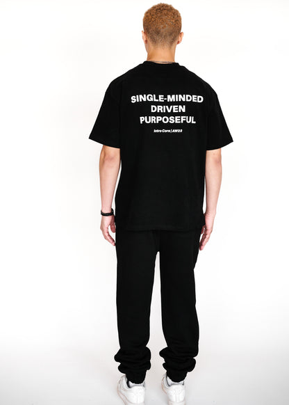 STRKRS black and white mens women's unisex 100% cotton heavyweight crewneck relaxed slightly oversized t-shirt. Single-minded Driven Purposeful on back of t-shirt