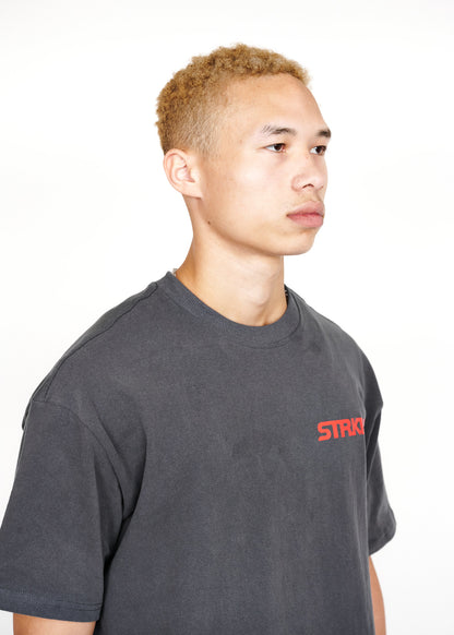 STRKRS washed gray and red mens women's unisex 100% cotton heavyweight crewneck relaxed slightly oversized t-shirt. Single-minded Driven Purposeful on back of t-shirt