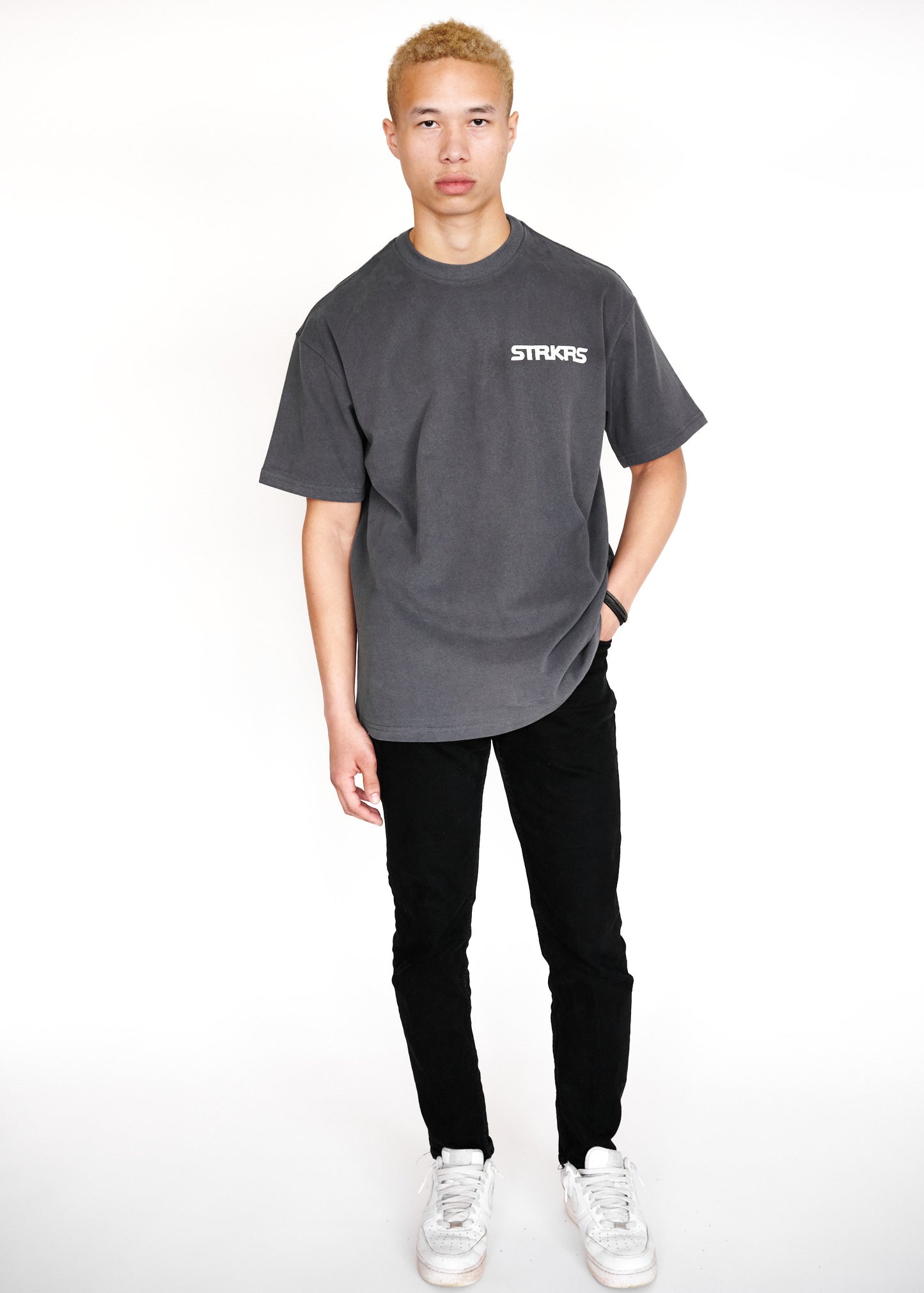 STRKRS washed gray and white mens women's unisex 100% cotton heavyweight crewneck relaxed slightly oversized t-shirt. Single-minded Driven Purposeful on back of t-shirt