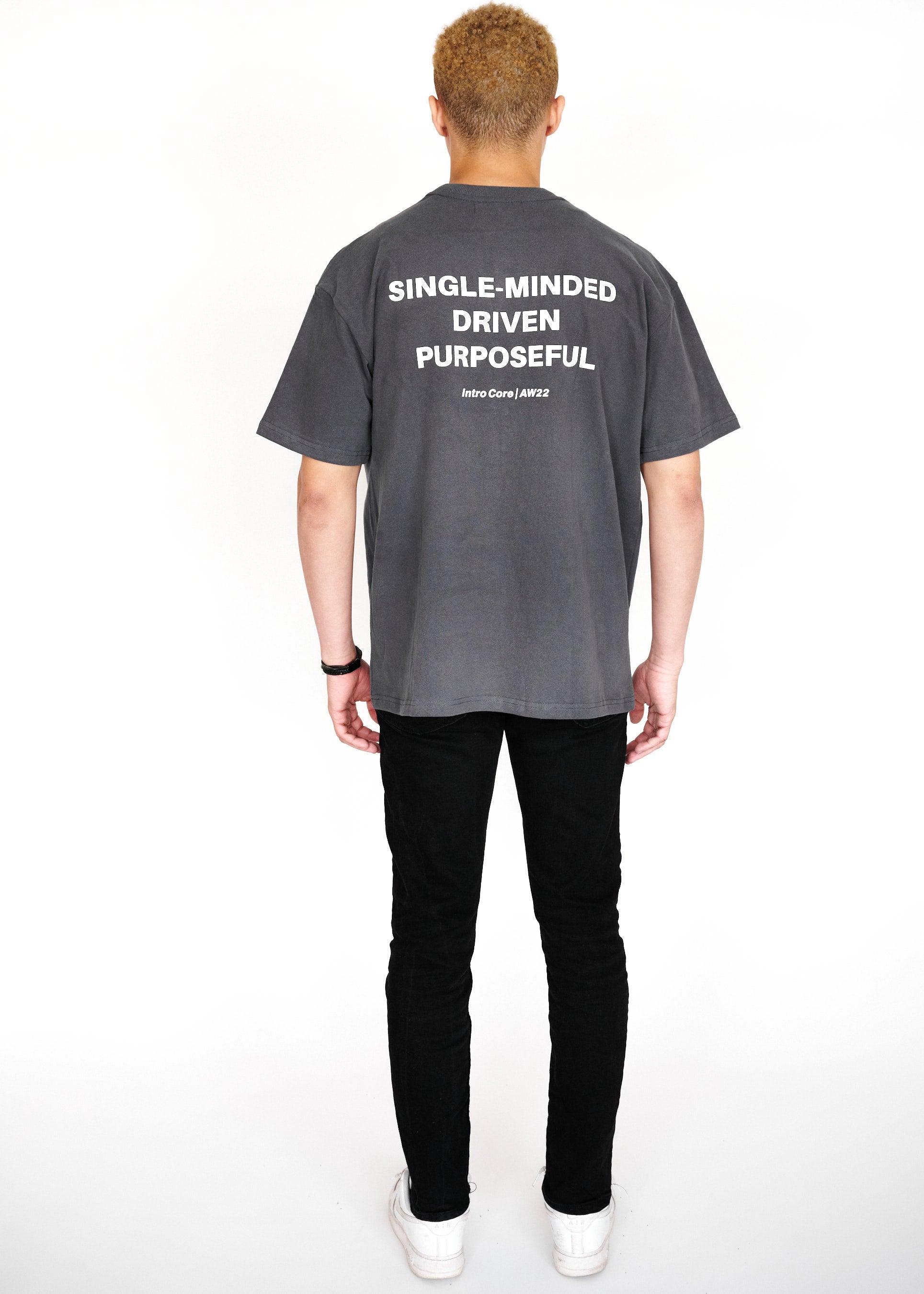 STRKRS washed gray and white mens women's unisex 100% cotton heavyweight crewneck relaxed slightly oversized t-shirt. Single-minded Driven Purposeful on back of t-shirt